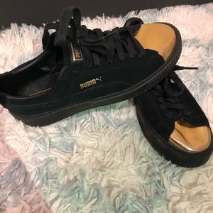 Black and Gold Puma Platform Shoes